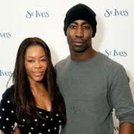 D.B. Woodside with his wife
